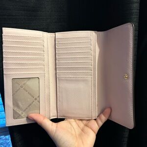 MICHAEL Michael Kors Pink Wallet with Tri-Fold Design and Multiple Compartments